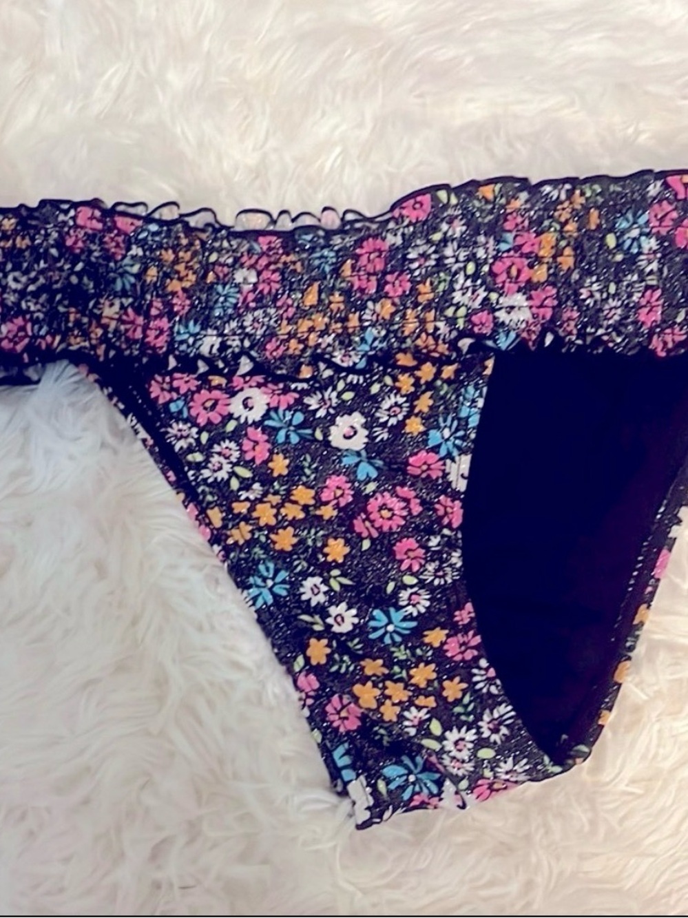 Cheeky bikini bottom flattering and Stays in place. Floral pattern w/ Ruffle  -
